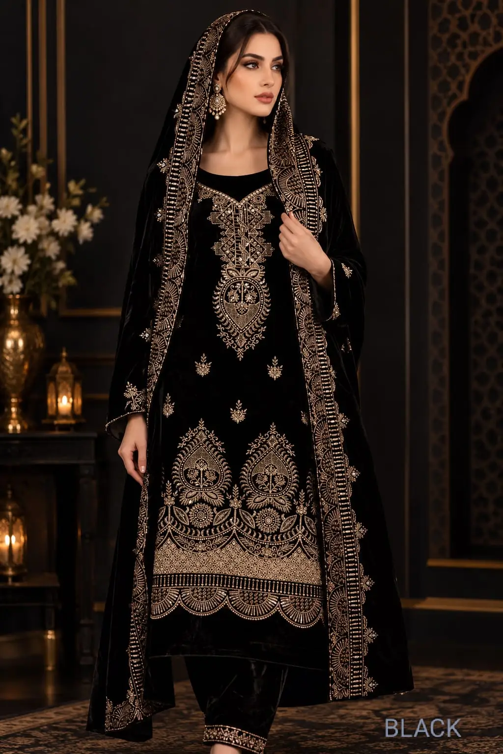 Black velvet suit with gold-toned embroidery shown as a stitched styling example